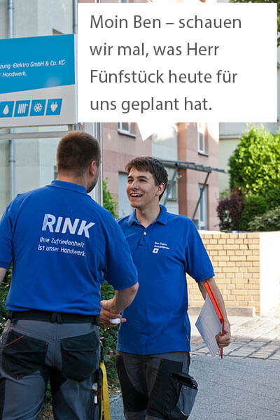 Begrüßung zwischen Mitarbeitern
